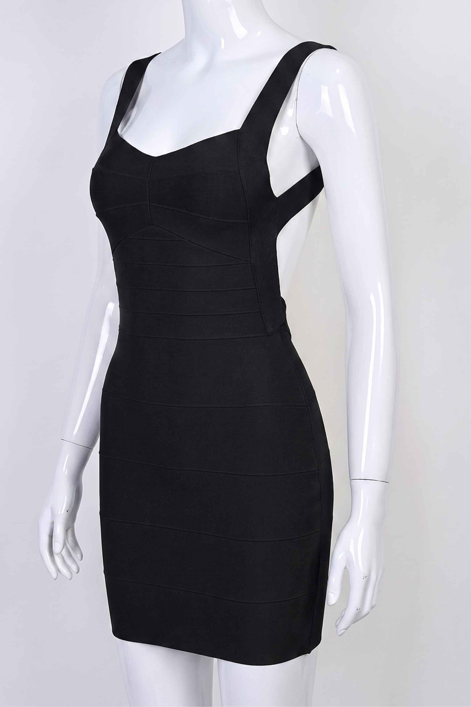 Woman wearing a figure flattering Maya Bandage Mini Dress - Classic Black BODYCON COLLECTION