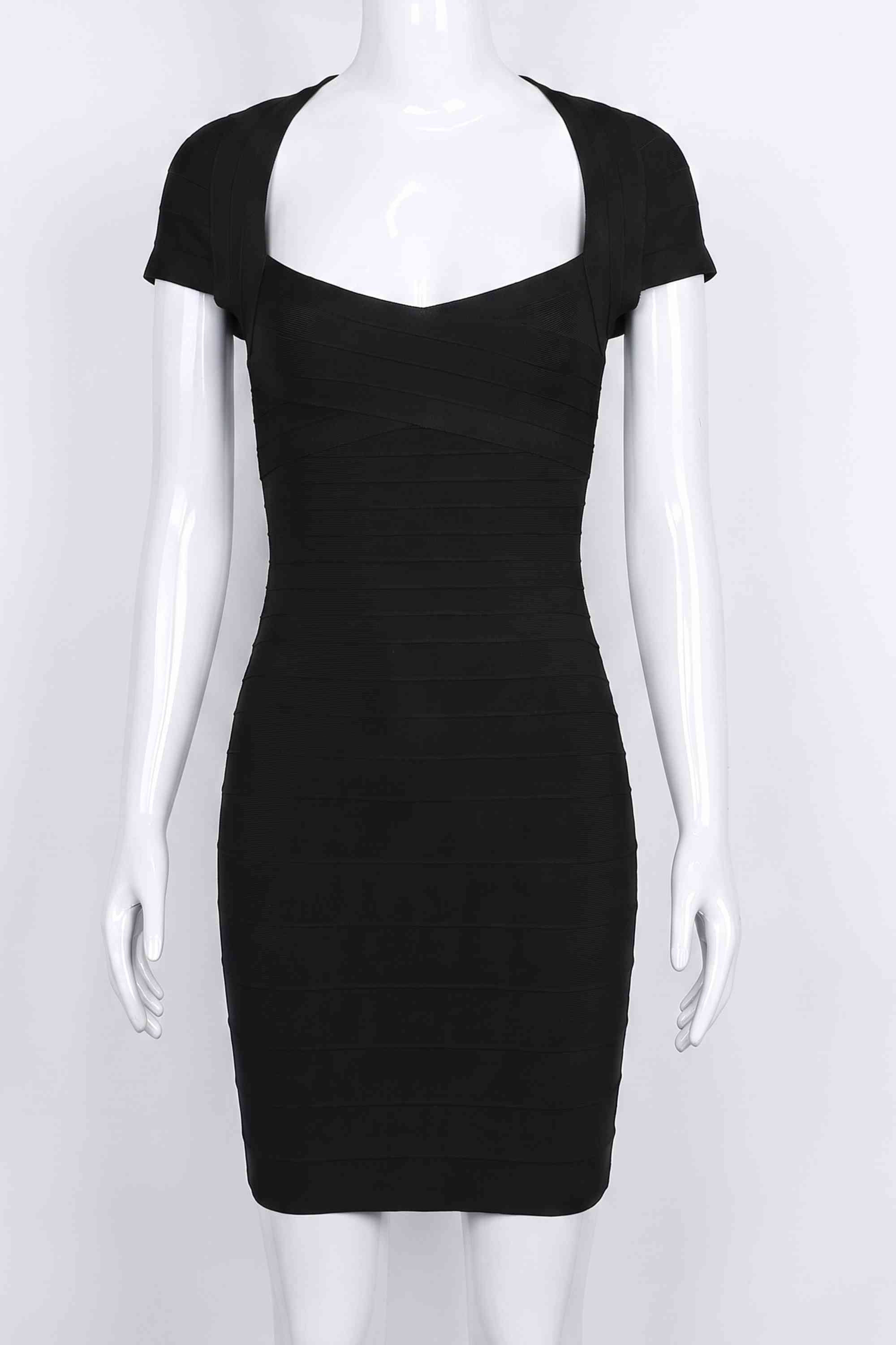 Woman wearing a figure flattering Miranda Bandage Mini Dress - Classic Black Bodycon Collection