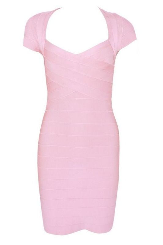 Woman wearing a figure flattering Miranda Bandage Mini Dress - Dusty Pink Bodycon Collection