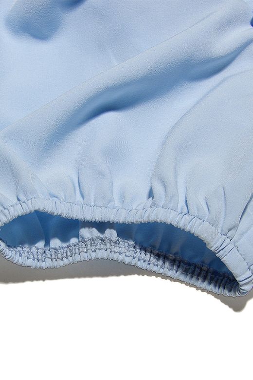 Woman wearing a figure flattering Misty Bodycon Mini Dress - Baby Blue BODYCON COLLECTION