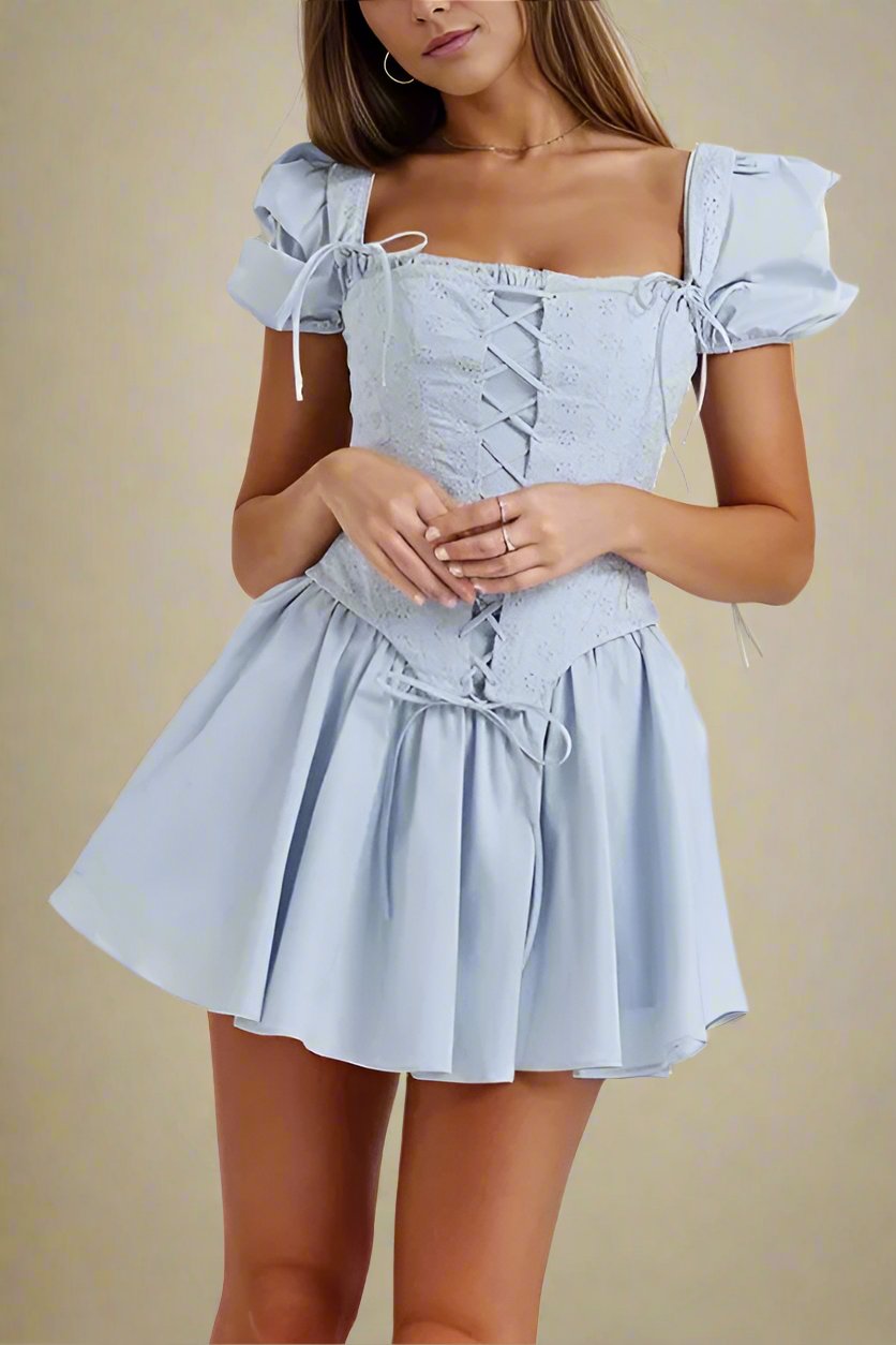 Woman wearing a figure flattering Misty Bodycon Mini Dress - Baby Blue BODYCON COLLECTION