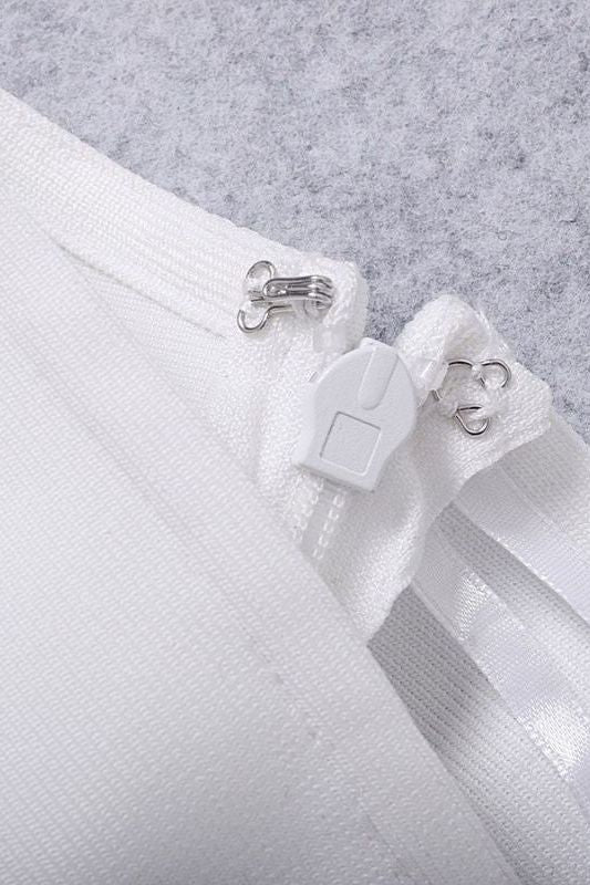 Woman wearing a figure flattering Molly Bandage Midi Dress - Pearl White BODYCON COLLECTION