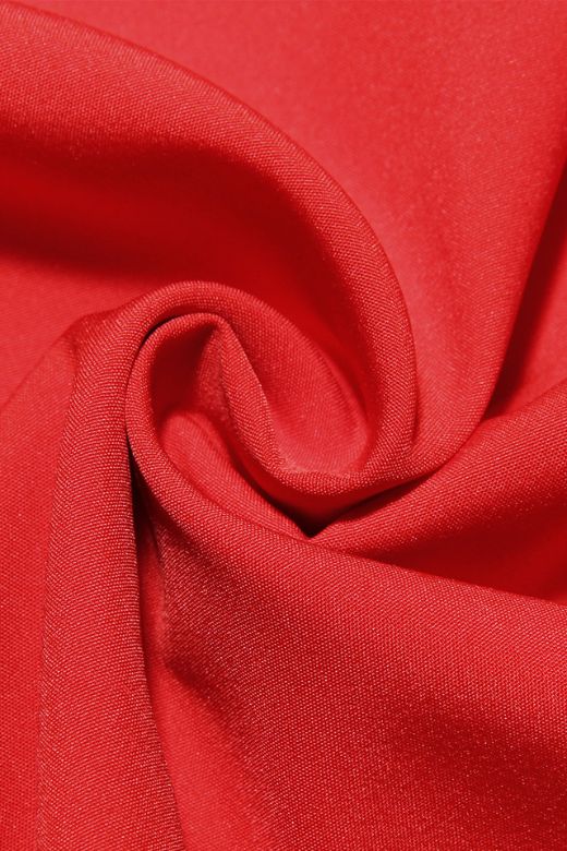 Woman wearing a figure flattering Monique Bodycon Dress - Lipstick Red BODYCON COLLECTION