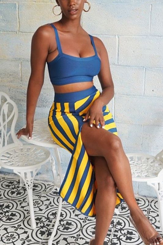 Woman wearing a figure flattering Nadia Bandage Crop Top and Midi Skirt Set - Royal Blue BODYCON COLLECTION