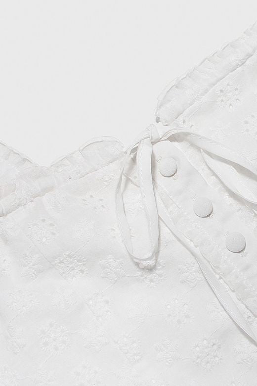 Woman wearing a figure flattering Nancy Bodycon Top - Pearl White BODYCON COLLECTION