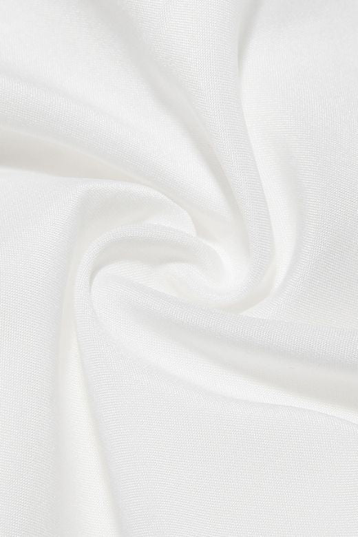 Woman wearing a figure flattering Nancy Bodycon Top - Pearl White BODYCON COLLECTION