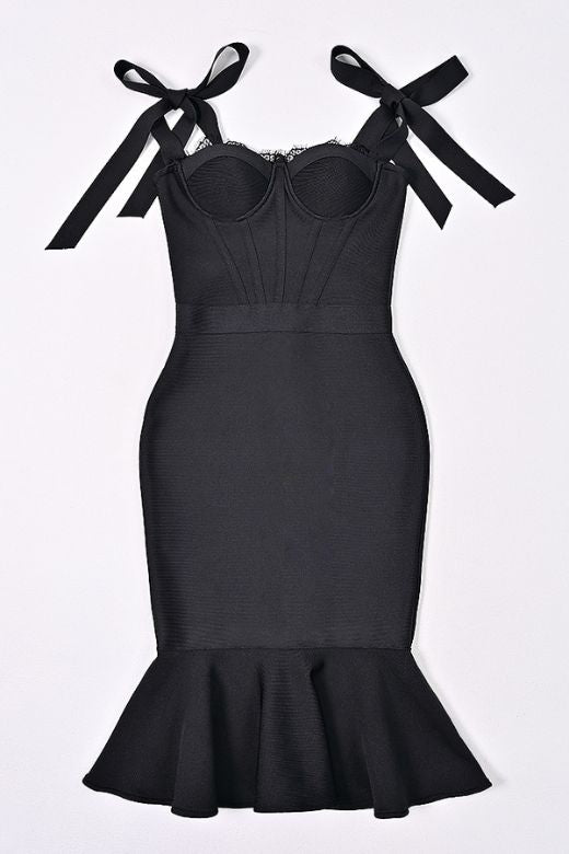 Woman wearing a figure flattering Nora Bandage Midi Dress - Classic Black BODYCON COLLECTION