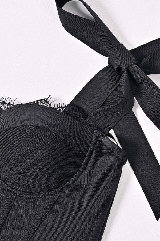 Woman wearing a figure flattering Nora Bandage Midi Dress - Classic Black BODYCON COLLECTION