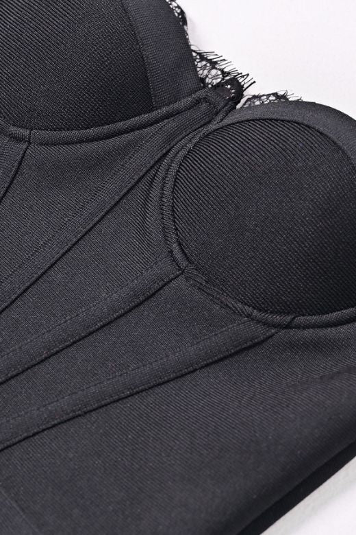 Woman wearing a figure flattering Nora Bandage Midi Dress - Classic Black BODYCON COLLECTION