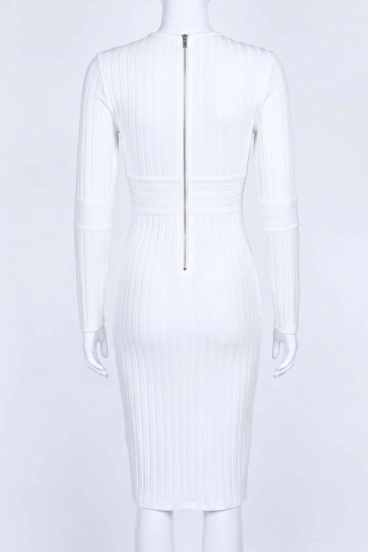Woman wearing a figure flattering Olivia Long Sleeve Bandage Dress - White Pearl Bodycon Collection