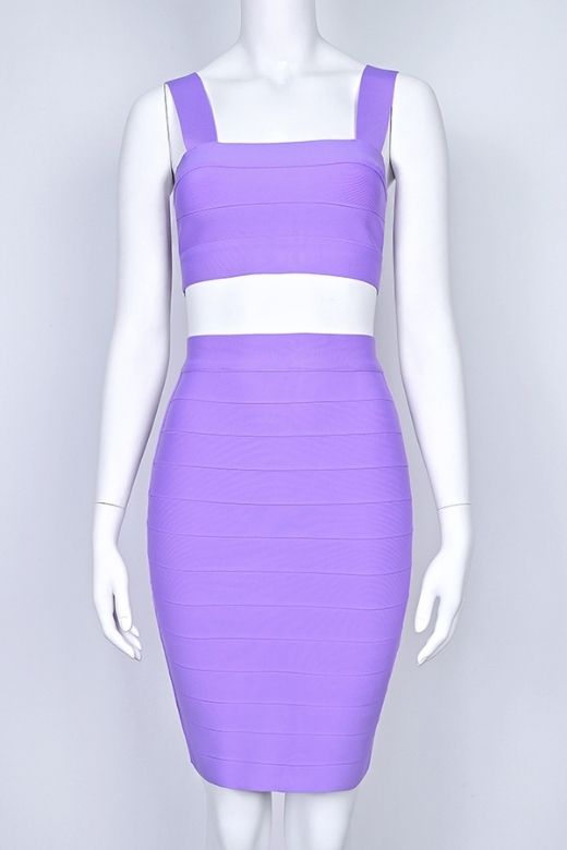 Woman wearing a figure flattering Ophelia Bandage Crop Top and Skirt Set - Violet BODYCON COLLECTION Pty Ltd