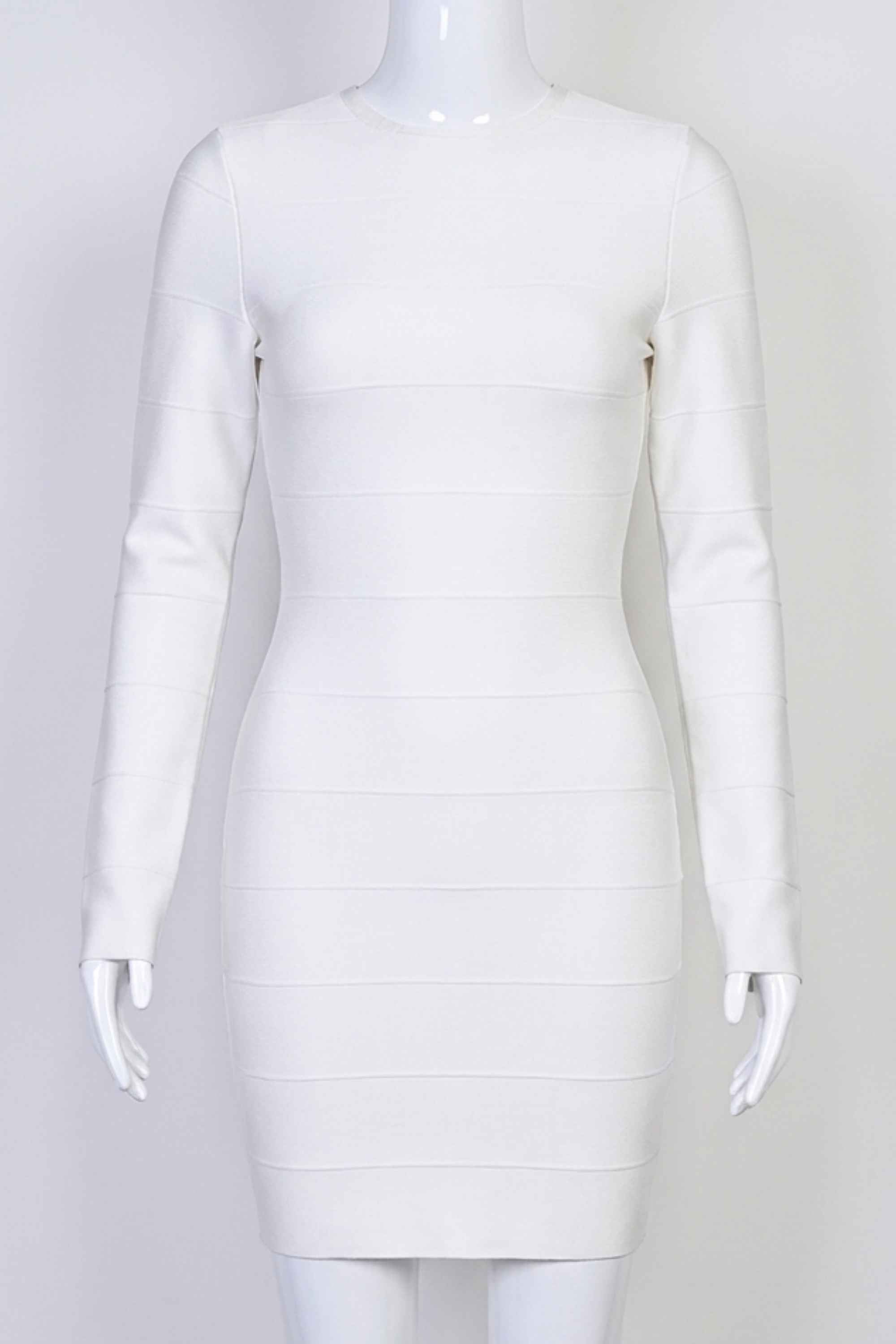 Woman wearing a figure flattering Pamela Long Sleeve Bandage Mini Dress - Pearl White BODYCON COLLECTION