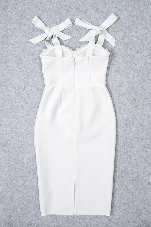 Woman wearing a figure flattering Payton Bandage Dress - Pearl White BODYCON COLLECTION