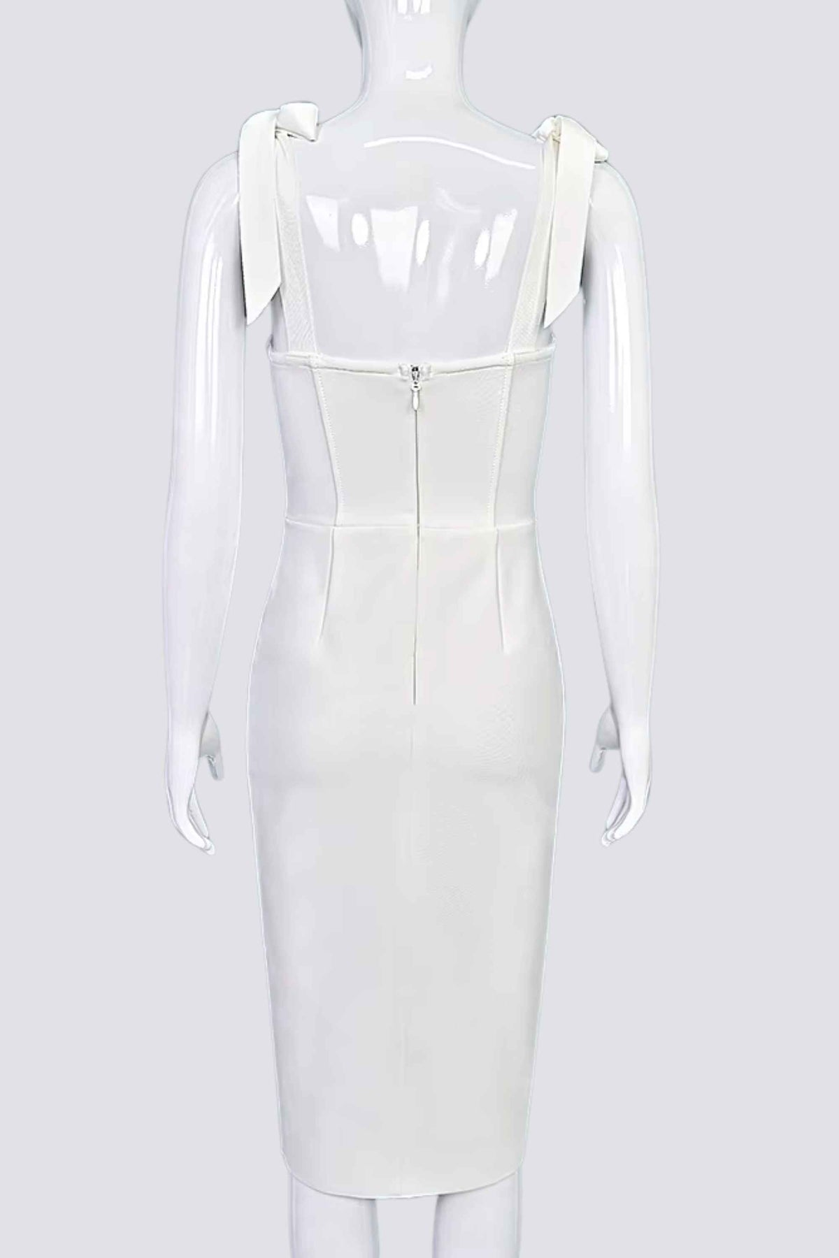 Woman wearing a figure flattering Payton Bandage Dress - White Pearl BODYCON COLLECTION