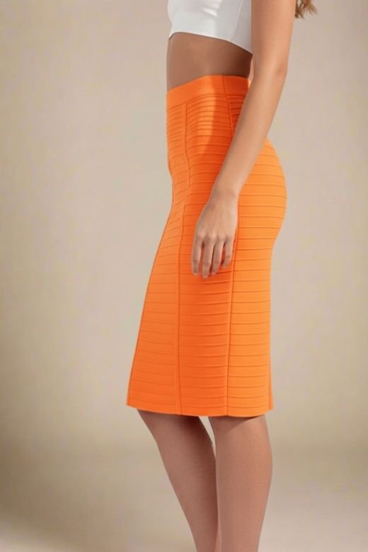 Woman wearing a figure flattering Pencil High Waist Bandage Knee Length Knitted Skirt - Apricot Orange BODYCON COLLECTION