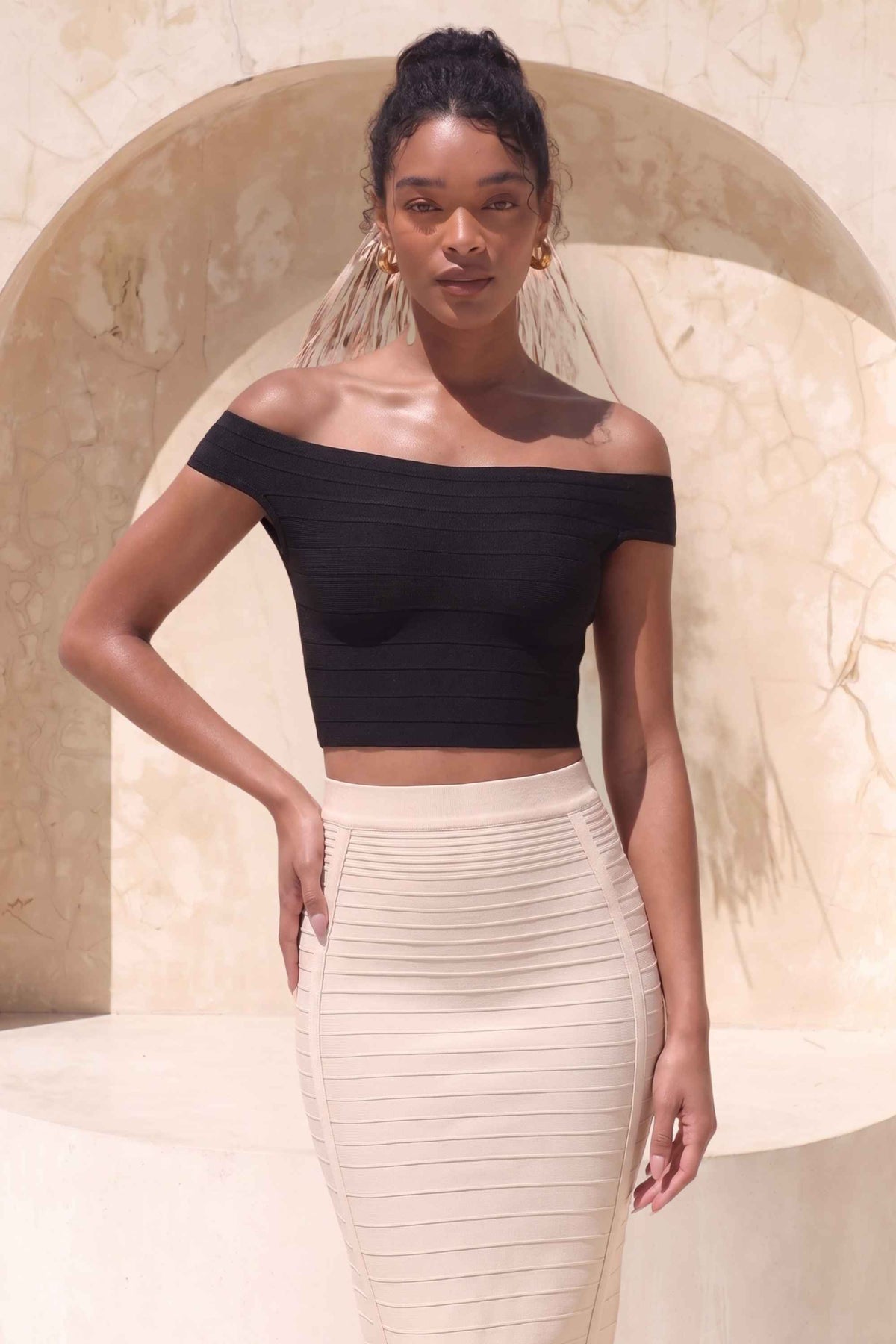 Woman wearing a figure flattering Pencil High Waist Bandage Knee Length Knitted Skirt - Cream BODYCON COLLECTION