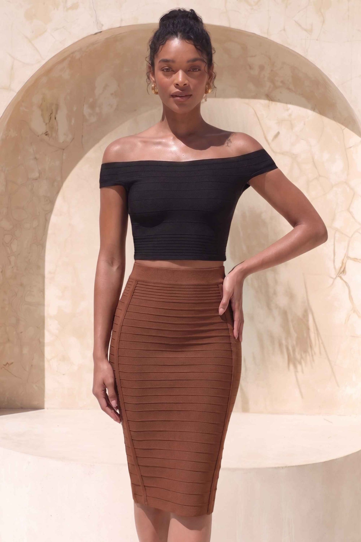 Woman wearing a figure flattering Pencil High Waist Bandage Knee Length Knitted Skirt - Tan Brown BODYCON COLLECTION