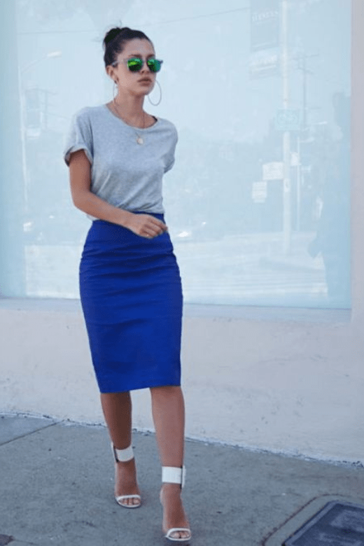 Woman wearing a figure flattering Pencil High Waist Bandage Knee Length Skirt - Hot Pink BODYCON COLLECTION