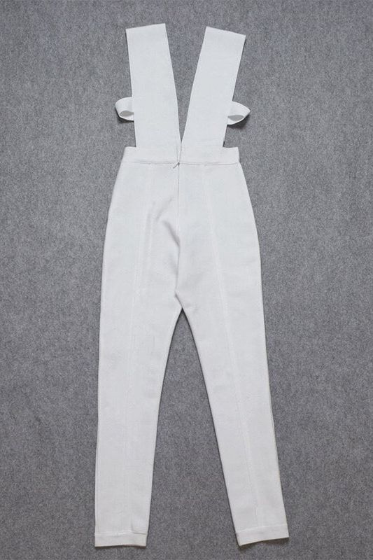 Woman wearing a figure flattering Pia Bandage Pants Jumpsuit - Pearl White BODYCON COLLECTION