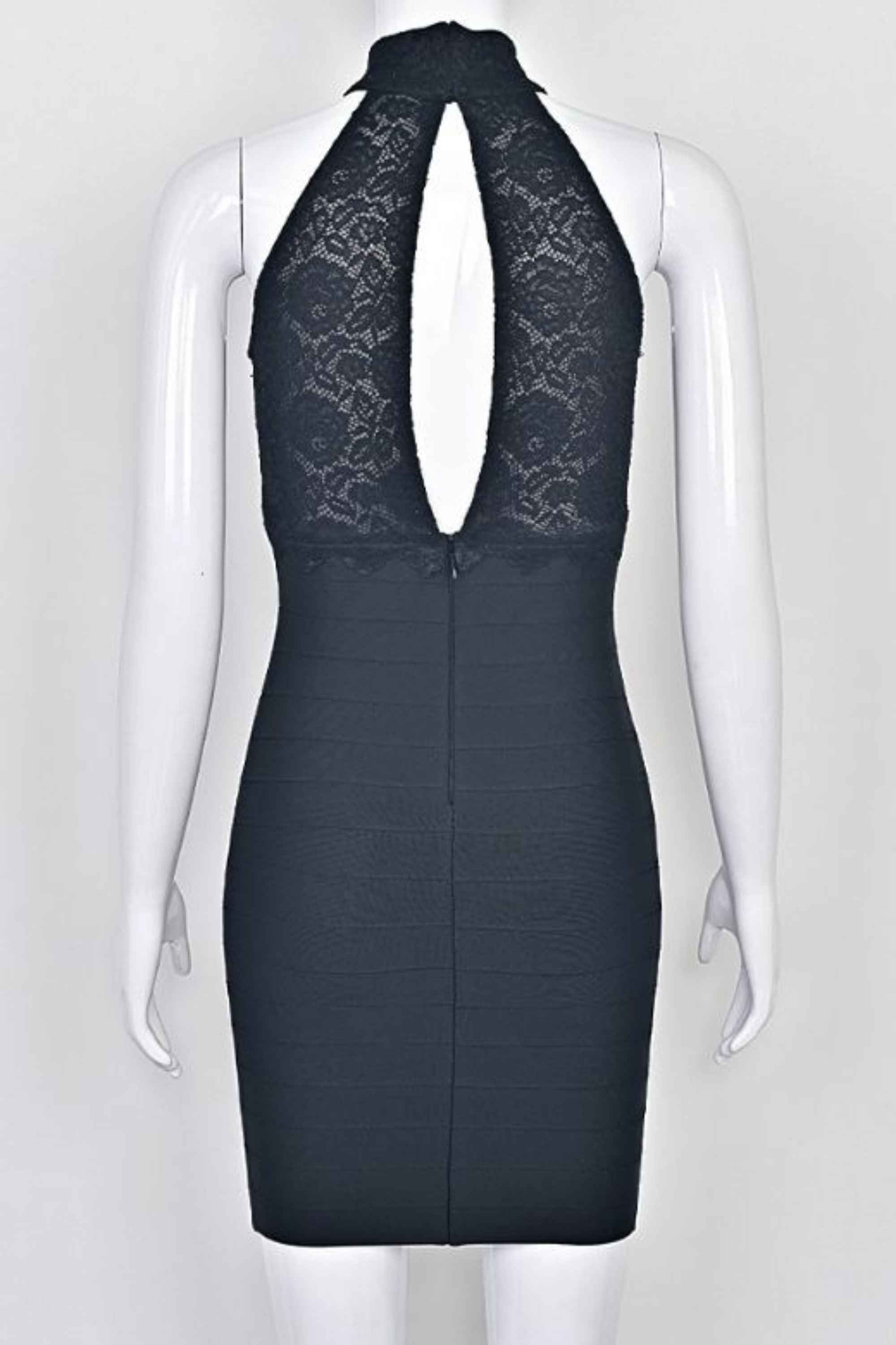Woman wearing a figure flattering Quinn Bandage Mini Dress - Classic Black BODYCON COLLECTION Pty Ltd