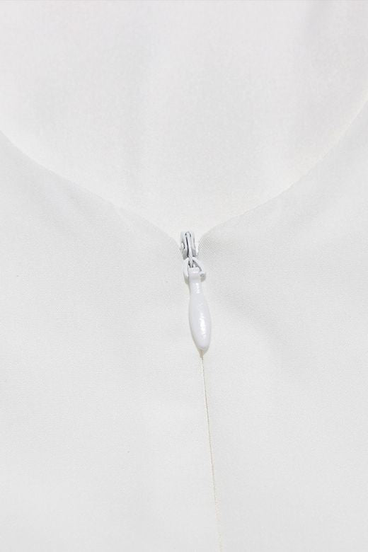 Woman wearing a figure flattering Rian Bodycon Mini Dress - Pearl White BODYCON COLLECTION