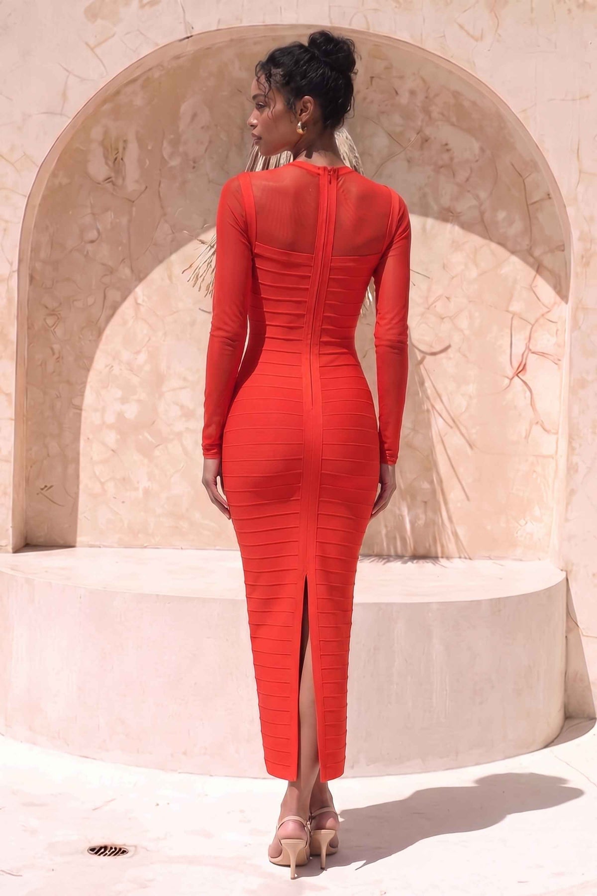 Woman wearing a figure flattering Robin Long Sleeve Bandage Maxi Dress - Lipstick Red BODYCON COLLECTION Pty Ltd
