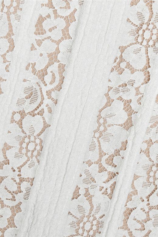 Woman wearing a figure flattering Rose Long Sleeve Bodycon Maxi Dress - Pearl White BODYCON COLLECTION