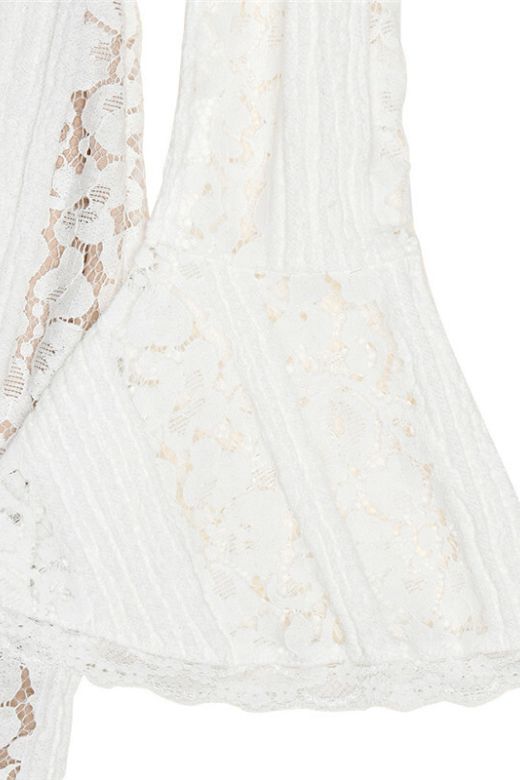 Woman wearing a figure flattering Rose Long Sleeve Bodycon Mini Dress - Pearl White BODYCON COLLECTION