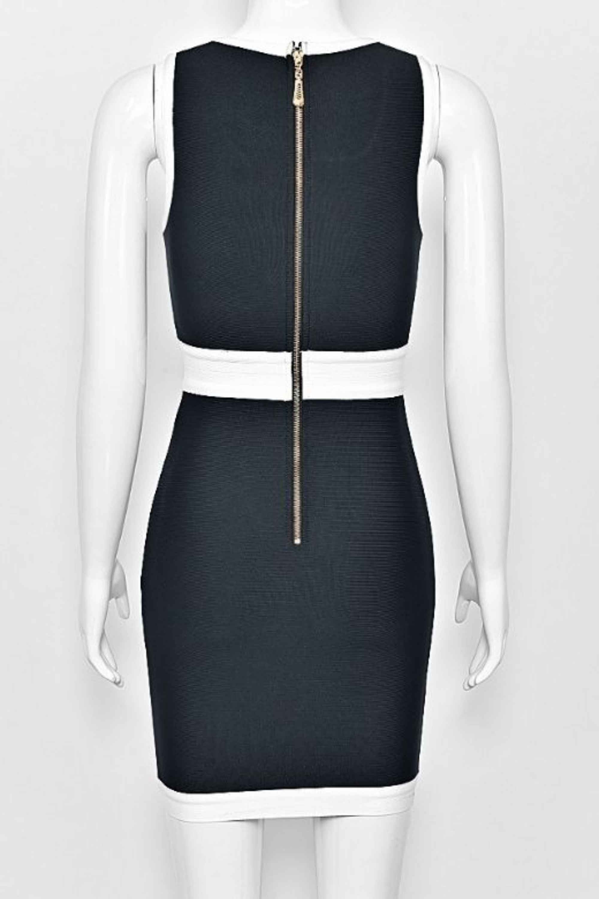 Woman wearing a figure flattering Rosie Bodycon Dress - Classic Black BODYCON COLLECTION