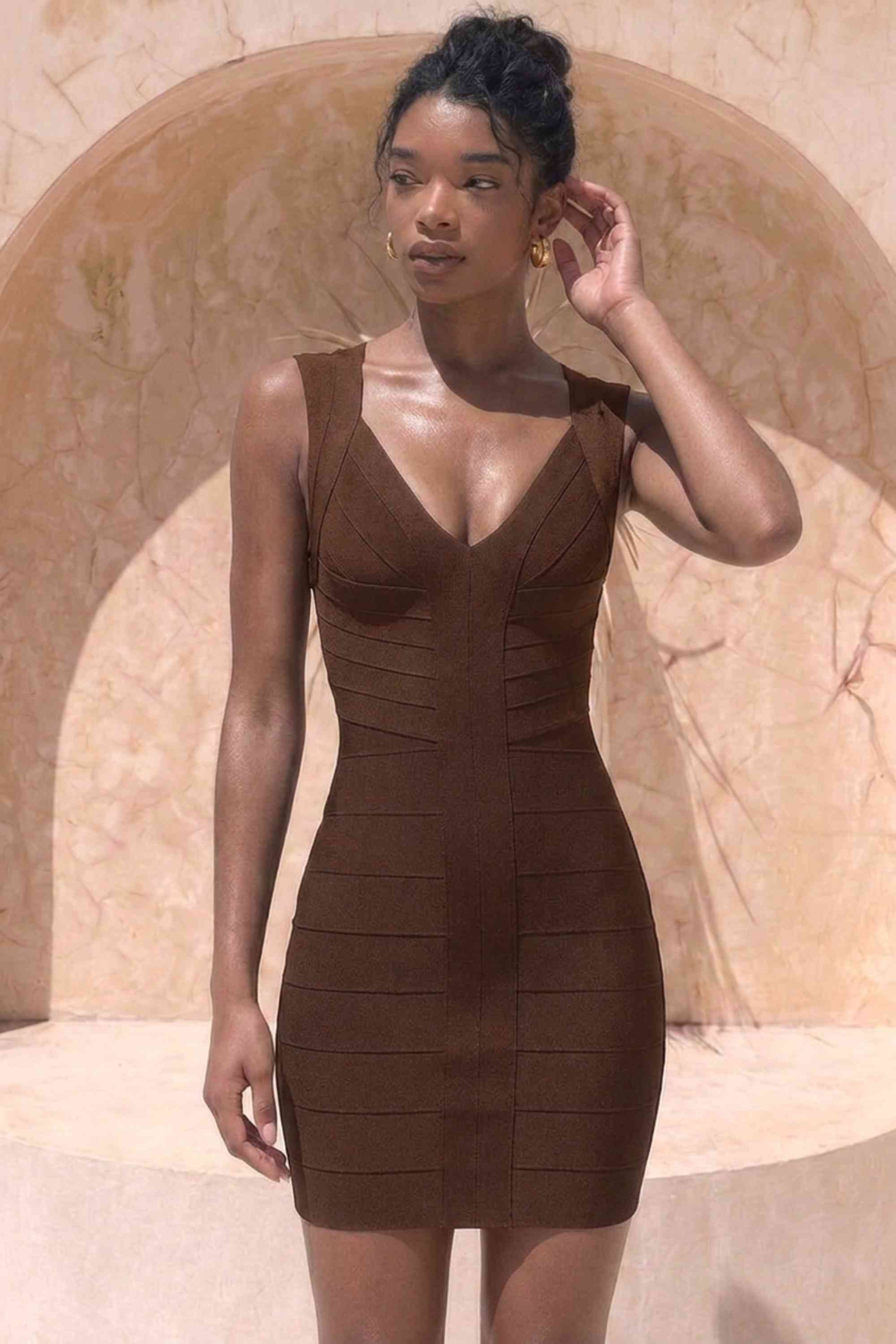 Woman wearing a figure flattering Sabrina Bandage Mini Dress - Coffee Brown BODYCON COLLECTION Pty Ltd