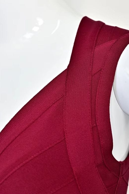 Woman wearing a figure flattering Sabrina Bandage Top - Red Wine BODYCON COLLECTION Pty Ltd