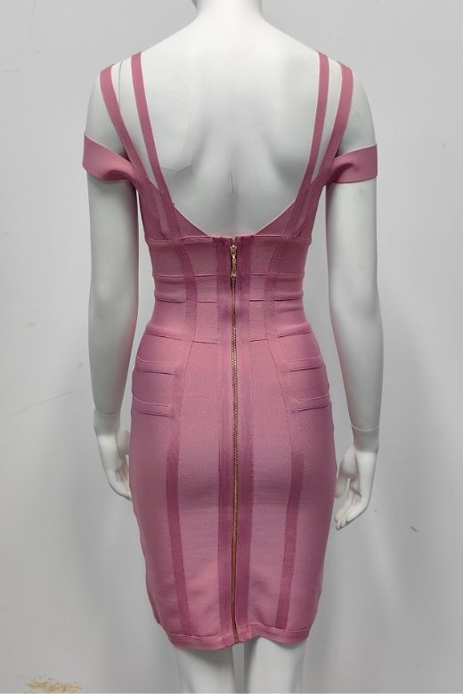 Woman wearing a figure flattering Sia Bandage Dress - Ballet Pink Bodycon Collection
