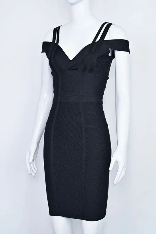 Woman wearing a figure flattering Sia Bandage Dress - Classic Black Bodycon Collection