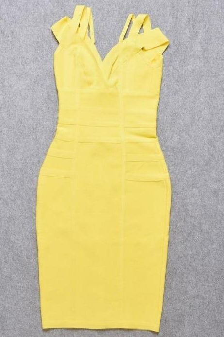 Woman wearing a figure flattering Sia Bandage Dress - Sun Yellow Bodycon Collection
