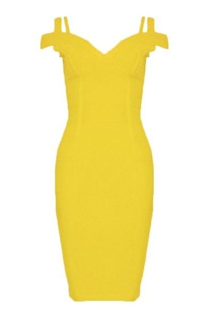 Woman wearing a figure flattering Sia Bandage Dress - Sun Yellow Bodycon Collection