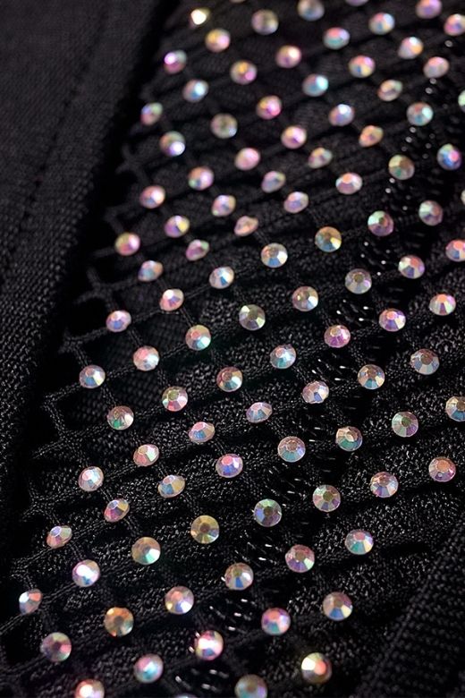 Woman wearing a figure flattering Sofie Bodycon Mini Dress - Classic Black BODYCON COLLECTION