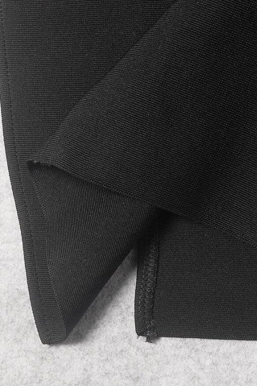 Woman wearing a figure flattering Sofie Off Shoulder Bodycon Dress - Classic Black BODYCON COLLECTION