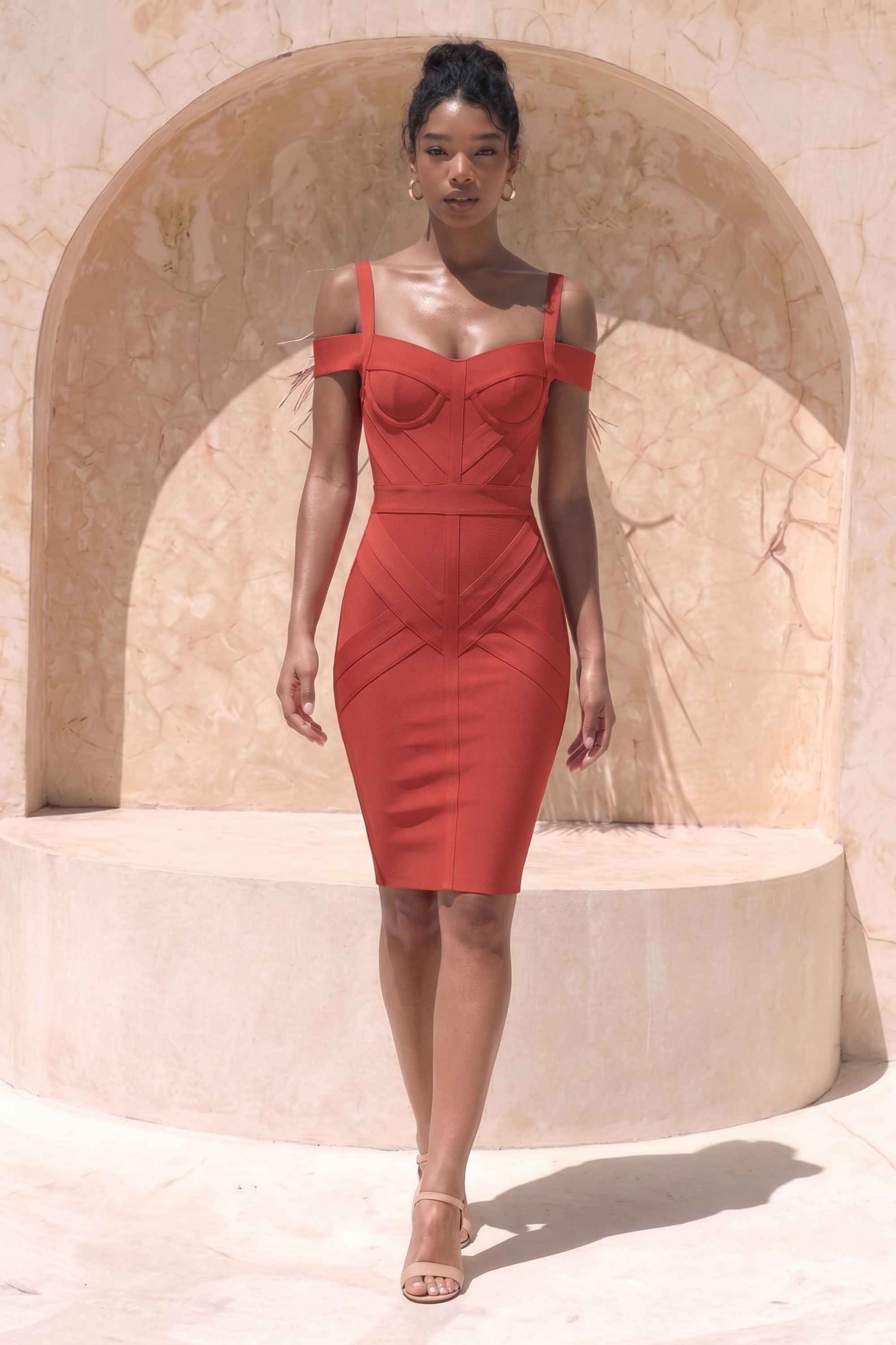 Woman wearing a figure flattering Sophia Bandage Dress - Lipstick Red Bodycon Collection