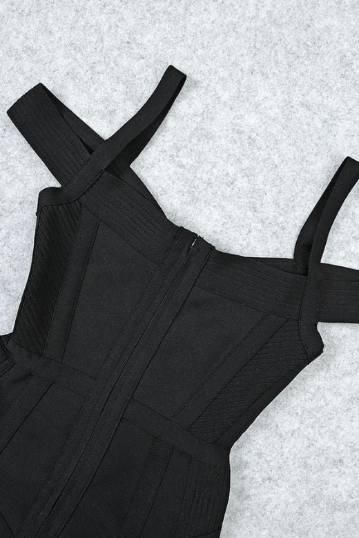 Woman wearing a figure flattering Sophia Bandage Mini Dress - Classic Black Bodycon Collection