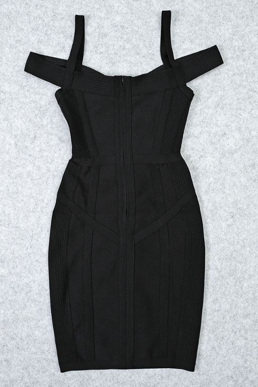 Woman wearing a figure flattering Sophia Bandage Mini Dress - Classic Black Bodycon Collection