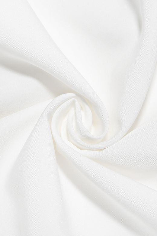 Woman wearing a figure flattering Tasmin Bodycon Midi Dress - Pearl White BODYCON COLLECTION