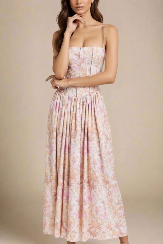 Woman wearing a figure flattering Tasmin Midi Dress - Pink Print BODYCON COLLECTION