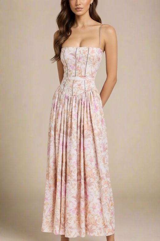 Woman wearing a figure flattering Tasmin Midi Dress - Pink Print BODYCON COLLECTION