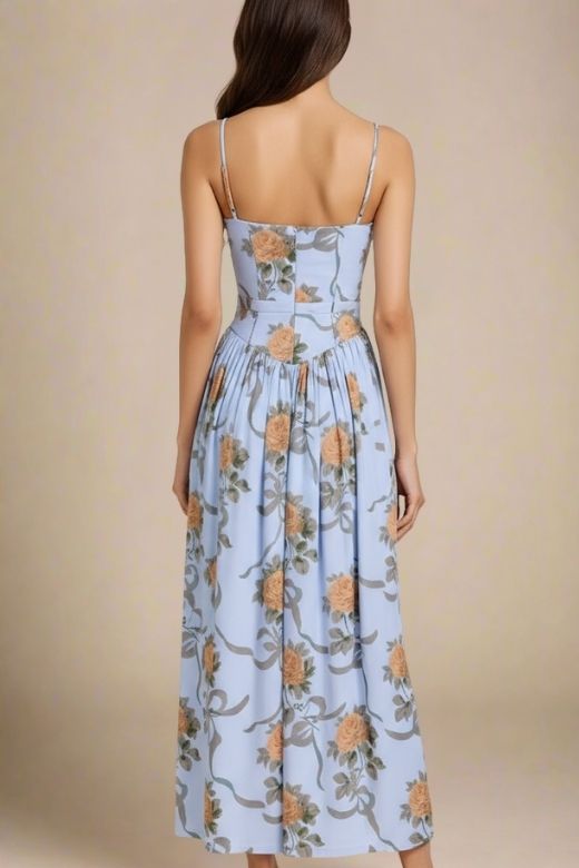 Woman wearing a figure flattering Tasmin Midi Dress - Sky Blue BODYCON COLLECTION