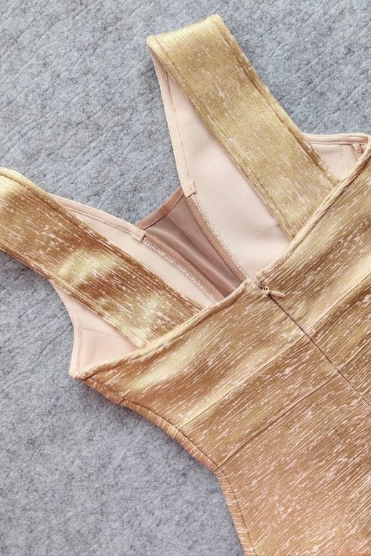 Woman wearing a figure flattering Tyler Bodycon Dress - Gold BODYCON COLLECTION Pty Ltd