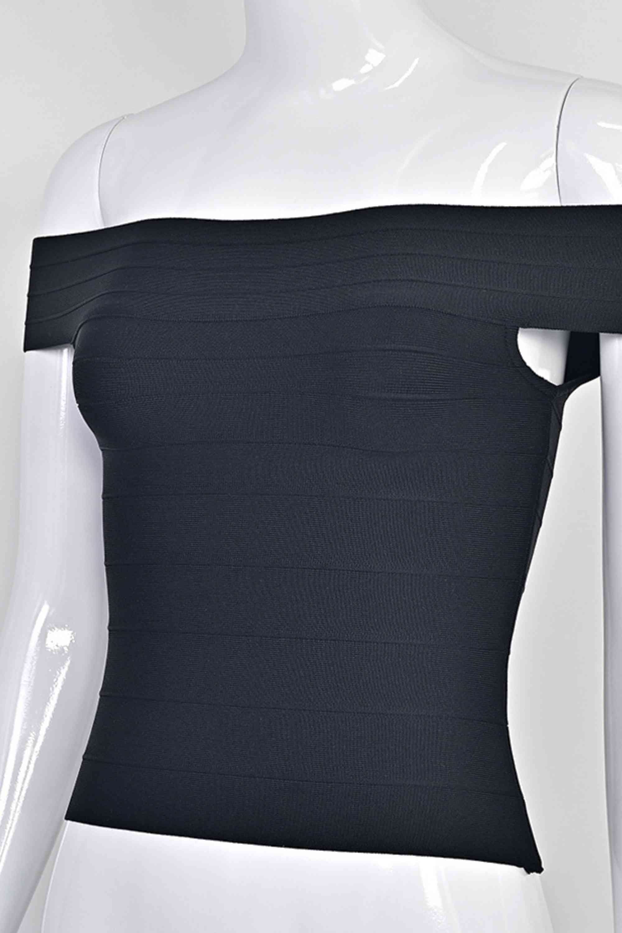 Woman wearing a figure flattering Vera Bandage Off Shoulder Top - Classic Black BODYCON COLLECTION Pty Ltd