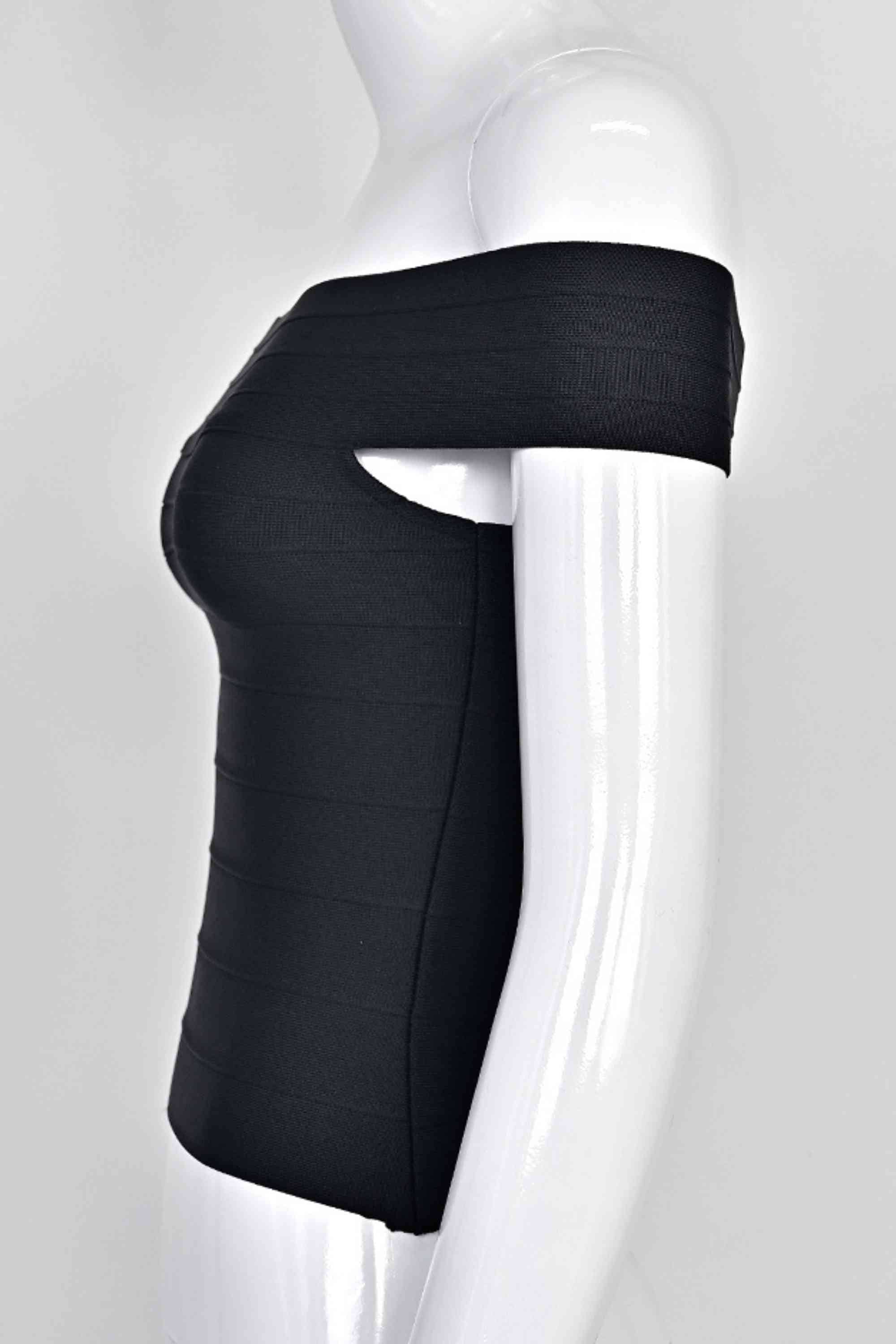 Woman wearing a figure flattering Vera Bandage Off Shoulder Top - Classic Black BODYCON COLLECTION Pty Ltd