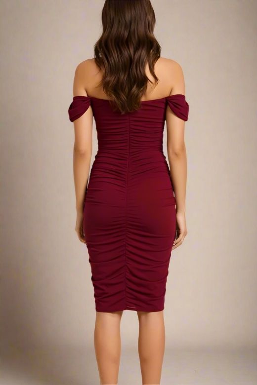 Woman wearing a figure flattering Zia Bodycon Wrap Dress - Red Wine Bodycon Collection