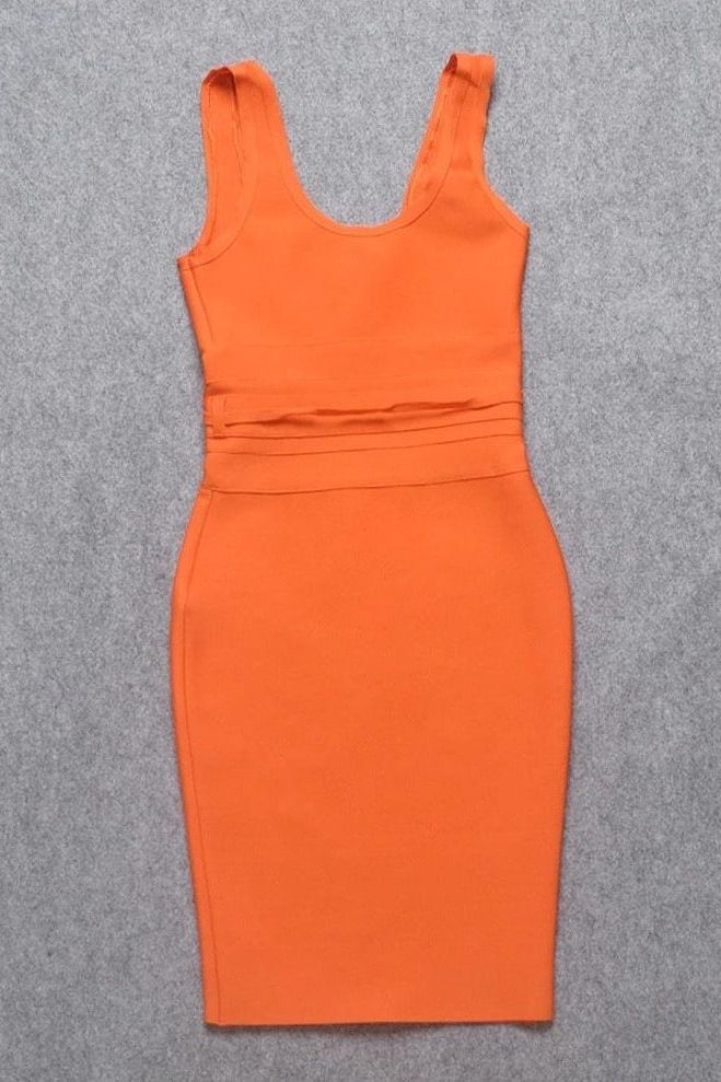 Woman wearing a figure flattering  Amy Bandage Dress - Apricot Orange Bodycon Collection