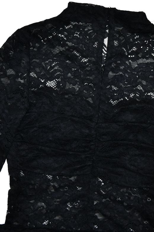 Woman wearing a figure flattering  Andie Long Sleeve Bodycon Wrap Mini Dress - Classic Black BODYCON COLLECTION